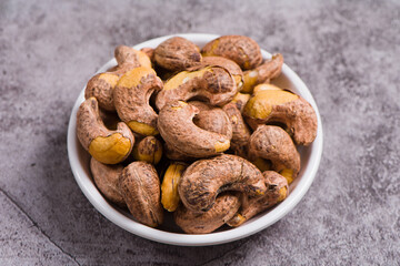 cashew nuts on wooden background