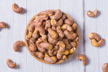 cashew nuts on wooden background