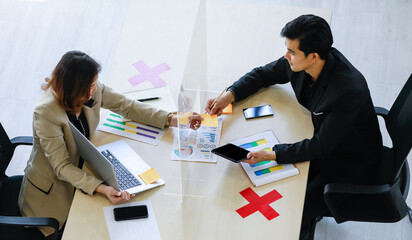 Top view shot of company office during coronavirus quarantine pandemic outbreak, businesswoman...