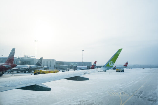 Saint-Petersburg, Russia - February 13, 2021: Airplane of Airline S7 in the airport Pulkovo in winter.