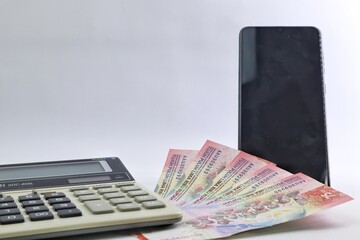 Rupiah the official currency of Indonesia. Business and finance concept. Uang 75000 Rupiah. Bank Indonesia.