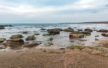 Sea coast with big boulders