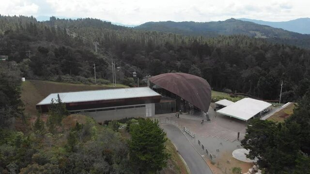 The Arvi Metrocable Station In Medellin, Colombia At Daytime - aerial descending