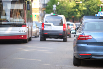 Close up of a car parked on city street side