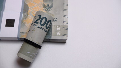 Indonesian Rupiah the official currency of Indonesia. Business and finance concept, Uang 2000...