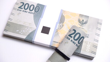 Indonesian Rupiah the official currency of Indonesia. Business and finance concept, Uang 2000...