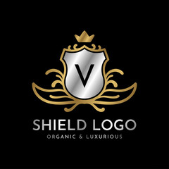 letter V shield gold and silver luxury vector logo design