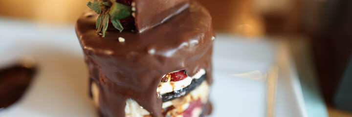 Closeup of appetizing delicious dessert with chocolate and strawberries