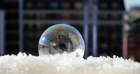Iridescent frozen soap bubble