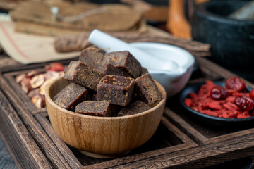 Lumpy brown sugar on a white background