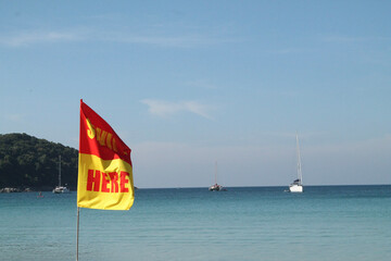 Fototapeta premium flag on the beach
