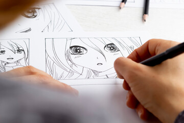 An artist draws a storyboard of an anime comics book. Manga style. - 477264846