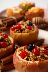 Concept of tasty food with baked apple, close up