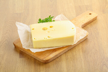 Maasdam cheese over the board