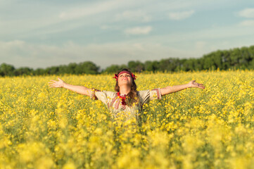 girl in spring blossoming field