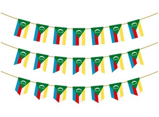 Obraz premium Comoros flag on the ropes on white background. Set of Patriotic bunting flags. Bunting decoration of Comoros flag