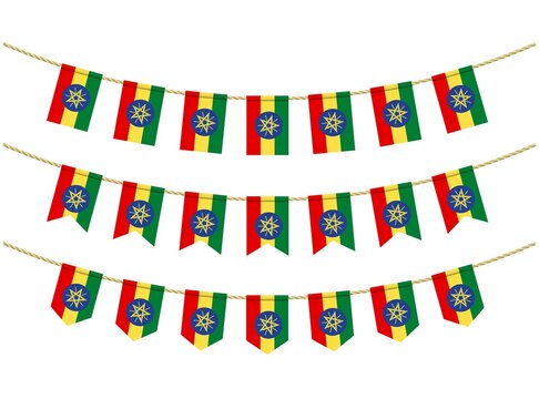 Ethiopia flag on the ropes on white background. Set of Patriotic bunting flags. Bunting decoration of Ethiopia flag