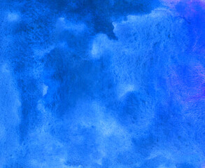 Hand drawn abstract blue watercolor background.Blue sky with clouds