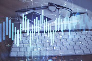 Double exposure of forex chart drawing and cell phone background. Concept of financial trading