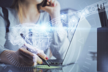 Multi exposure of woman hands working on computer and human brain hologram drawing. Ai tech concept.
