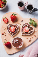 Breakfast for two, Valentines day food for couple in love with chocolate toasts and strawberry