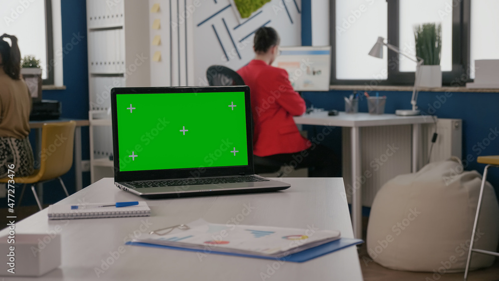 Poster close up of green screen on laptop in business office. computer with chroma key background and isola