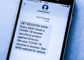 Text message `Get BOOSTED, COVID-19