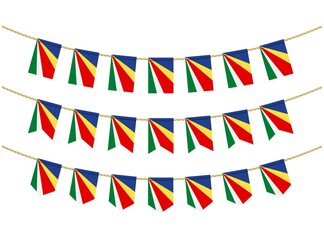 Seychelles flag on the ropes on white background. Set of Patriotic bunting flags. Bunting decoration of Seychelles flag
