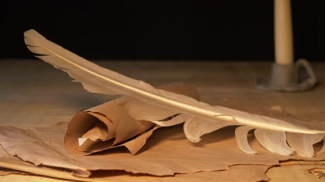 Parchment paper and writing quill 