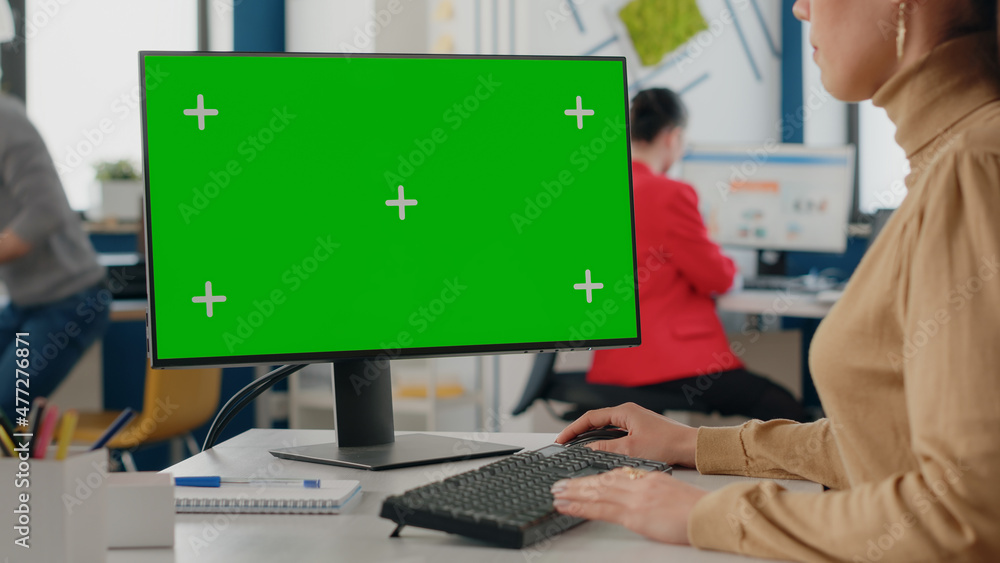 Poster close up of employee using green screen on monitor. business woman working with isolated chroma key 