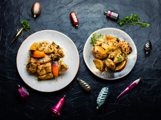 Chicken meat baked with orange.