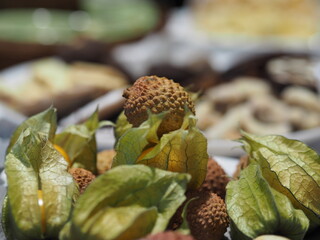 detail of lychee with a festive table