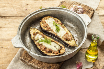 Stuffed eggplant ready to eat with ground meat, vegetables, and spices