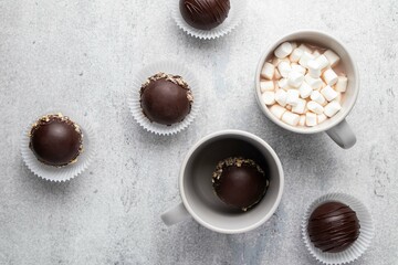 Hot cocoa chocolate ball bomb with marshmallow. Holiday winter drink. Handmade Christmas present.
