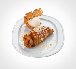 Apple strudel with an ice cream scoop. On a white background.