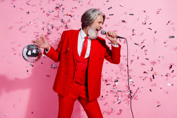 Portrait of attractive trendy cool funky grey-haired man singing hit rock disco club isolated over...