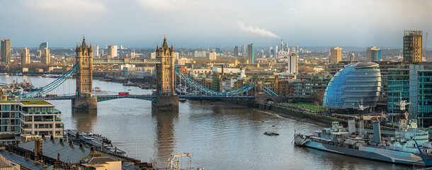Aerial panorama of the famous historical Tower Bridge over the River Thames in London, England