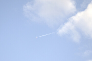 Naklejka na ściany i meble airplane in the sky