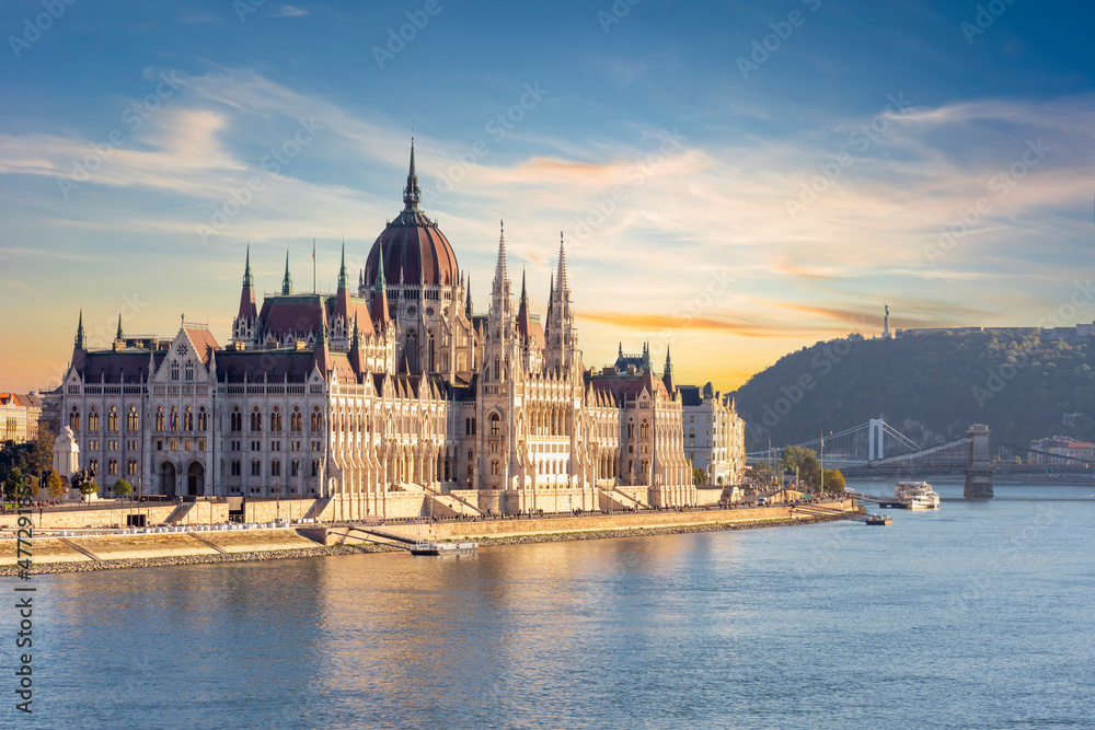 Poster hungarian parliament building at sunset, budapest, hungary