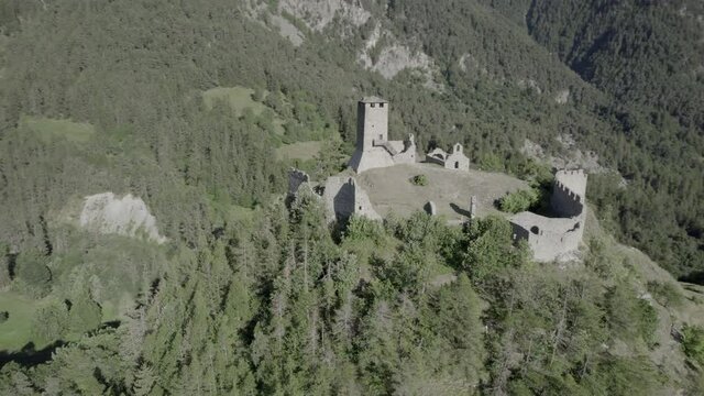 video orbits and spiral with drone over cly castle in aosta valley italy