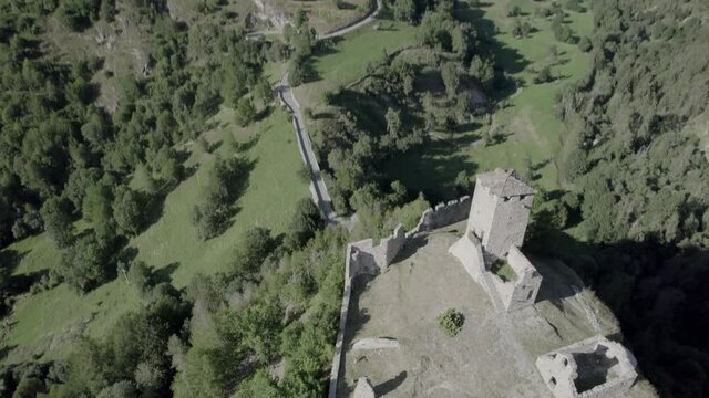 aerial video with drone over the cly castle in aosta valley italy