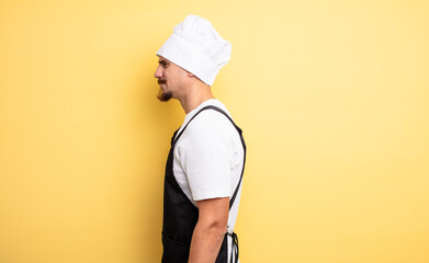 chef man on profile view thinking, imagining or daydreaming