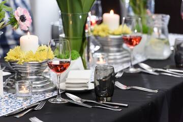 Glass of red wine on a served table in a restaurant