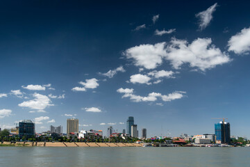 Fototapeta na wymiar Phnom Penh city riverside skyline modern buildings in Cambodia