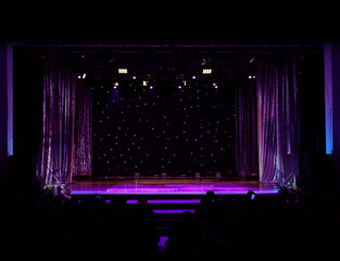 Theatrical scene without actors, scenic light and smoke