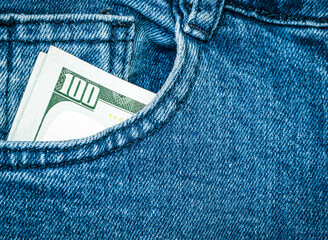  100 dollar bills in back jeans pocket