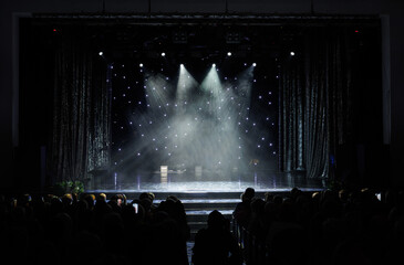 Theatrical scene without actors, scenic light and smoke