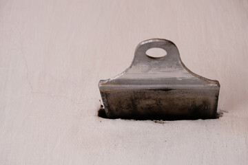 Open metal chimney flap. Whitewashed oven. Copy space. 