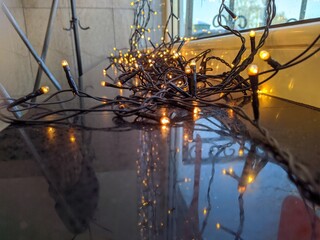Christmas garland with warm light in the interior.