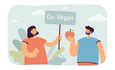 Activist showing go vegan placard to man eating apple. Vegan woman promoting veganism flat vector illustration. Healthy lifestyle, diet, food concept for banner, website design or landing web page